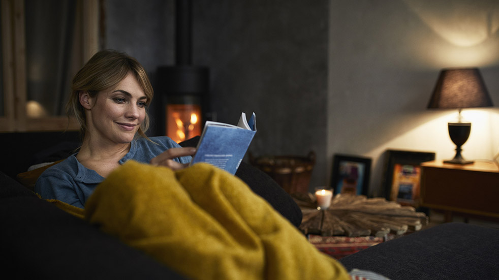 10 easy ways to boost your mood this autumn woman reading book